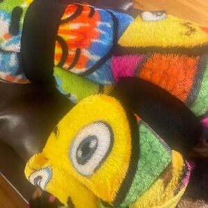 A variety of random funny emoji throw blankets